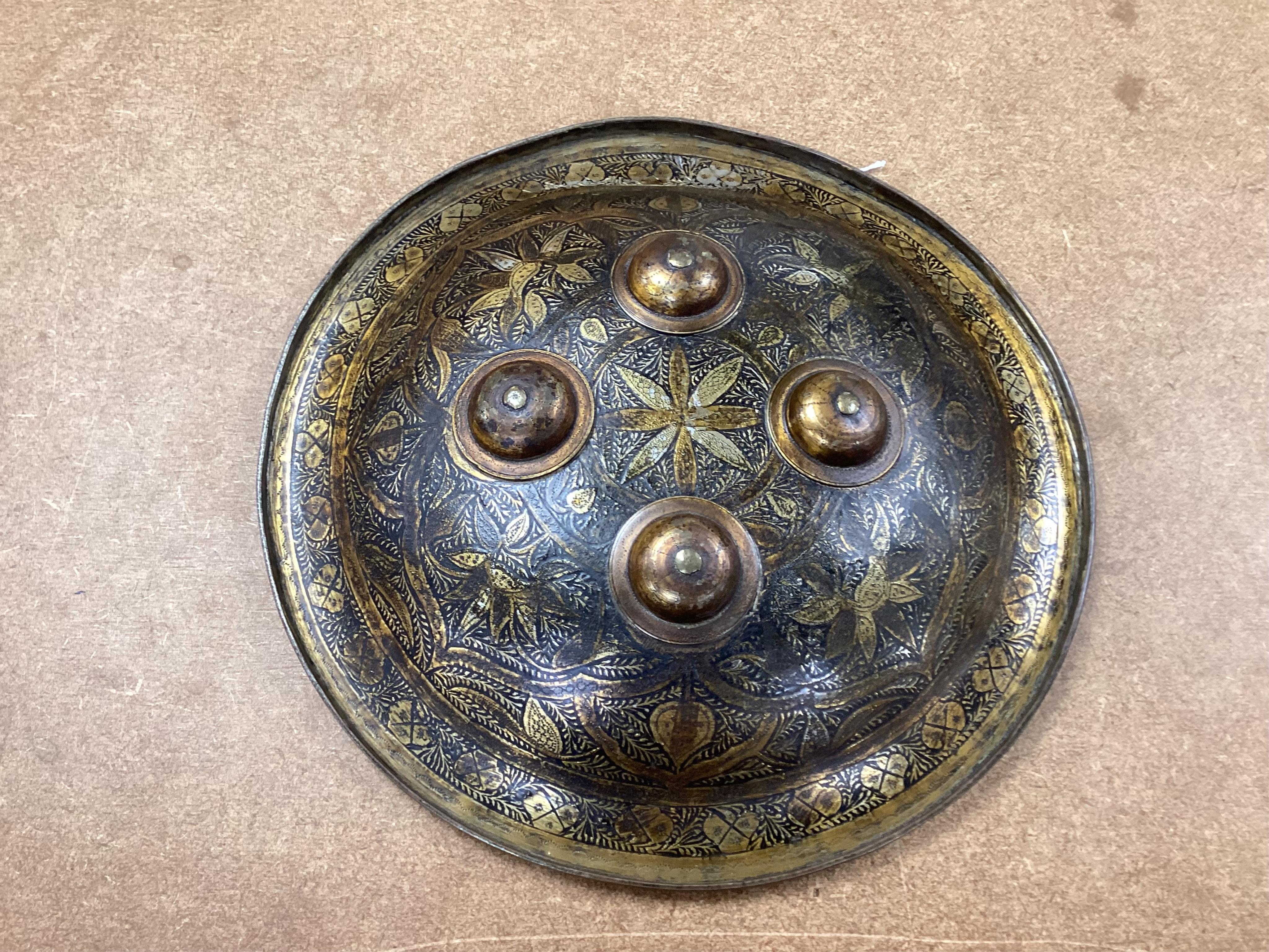 Two Persian style shields, one papier mache the other metal, largest 34cm diameter. Condition - good